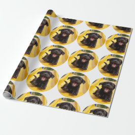 Fröhliche schwarze Labradormischlinge auf Rutschba Geschenkpapier