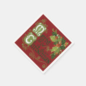 Fröhliche Sprigs von Holly im roten Hintergrund Serviette (Ecke)