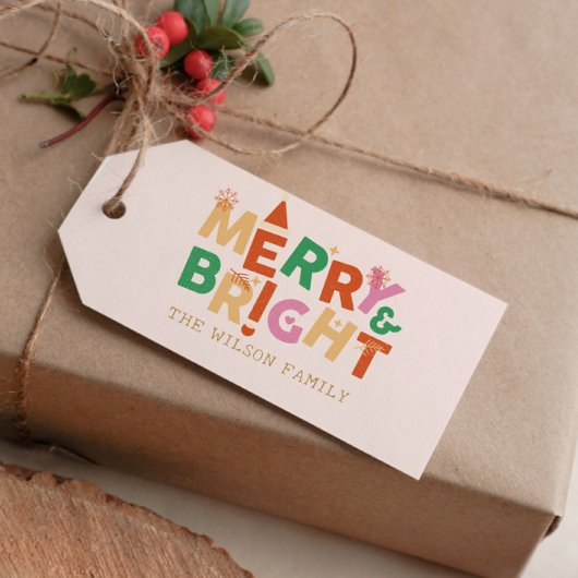 Fröhliche und helle farbenfrohe Weihnachten Geschenkanhänger