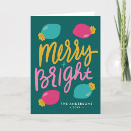 Fröhliche und helle Weihnachtsleuchten außerhalb d Feiertagskarte