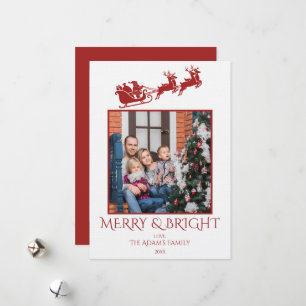 Fröhliche und strahlende Santa-Schlitten-Familie 2 Feiertagskarte