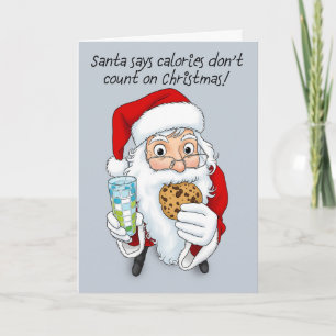 Fröhliche Weihnachten Lustiger Santa isst Kekse