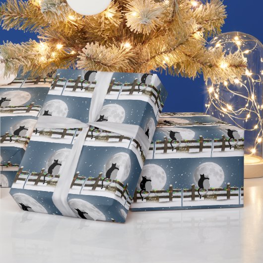 Fröhliche Weihnachtskatzen auf einem Winterzaun Geschenkpapier (Feiertage)