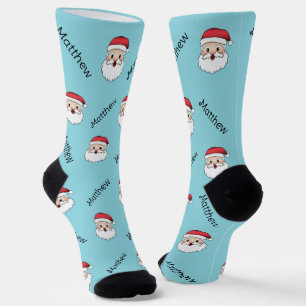 Fröhliche Weihnachtsmann-Köpfe mit individuellem N Socken