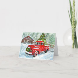 Fröhliche Weihnachtswelpen, die roten LKW fahren Karte