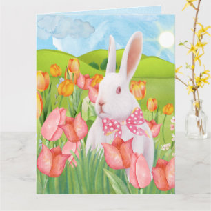 Fröhlicher Osterhase mit rosafarbenen Tulpen Karte