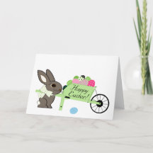 Fröhlicher Osterhase mit Schubkarre voller Eier Gr