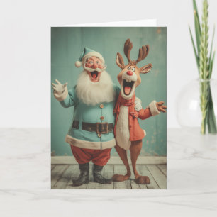 Fröhlicher Santa und Rudolph jubeln Feiertagskarte