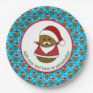 Fröhlicher Weihnachtskartoffel, der einen Weihnach Pappteller