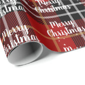 Fröhlicher Weihnachtstext in Schneeflocken auf Tar Geschenkpapier (Rolleneckpunkt)