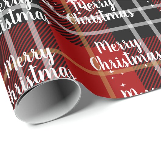 Fröhlicher Weihnachtstext in Schneeflocken auf Tar Geschenkpapier (Rolleneckpunkt)