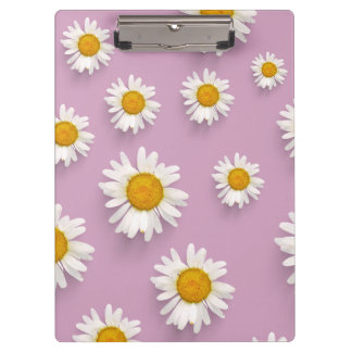 Fröhliches Daisy-Muster auf rosa Hintergrund Klemmbrett