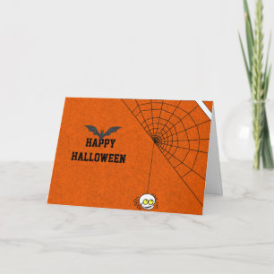 Fröhliches Halloween mit schwarzer Fledermaus und Karte