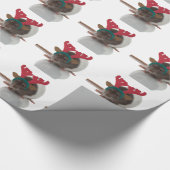 Fröhliches Ratmas mit den Geweihen an Geschenkpapier (Ecke)