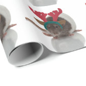 Fröhliches Ratmas mit den Geweihen an Geschenkpapier (Rolleneckpunkt)