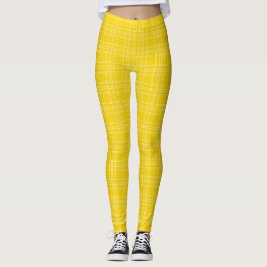 Front and back view of vibrant yellow checkered  leggings (Vorderseite)