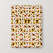 Front and back views of a floral-patterned  button (Vorderseite)