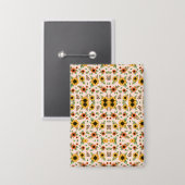 Front and back views of a floral-patterned  button (Vorderseite/Rückseite)