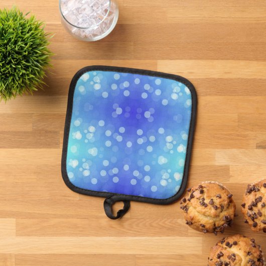 Front view features a pot holder with a blue  topflappen (Oben Unten)