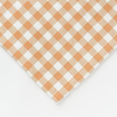 Front view of a fabric with a warm orange  fleecedecke (Ecke)
