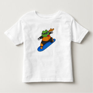 Frosch als Snowobarder mit Snowboard Kleinkind T-shirt