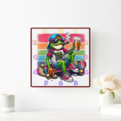 Frosch bereit zum Party mit einem Drink auf einem Quadratische Wanduhr (Zuhause)