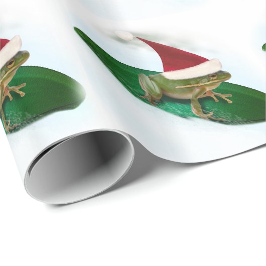 Frosch, der durch den Schnee auf einem Lilienpad s Geschenkpapier (Rolleneckpunkt)