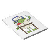 Frosch im Wissenschafts-Labrador Notizblock (angewinkelt)