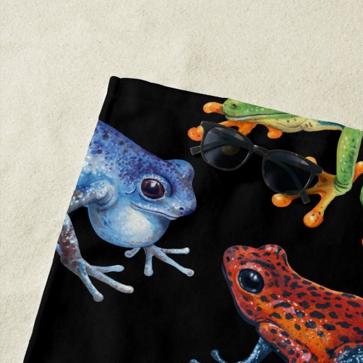 Frösche auf schwarz strandtuch (Beispiel)