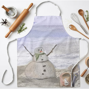 Frostiger Schneemann am Strand große Schürze