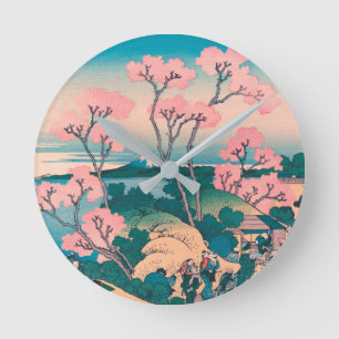 Frühjahrs-Picknick unter Kirschbaumblüten am Fuji Runde Wanduhr