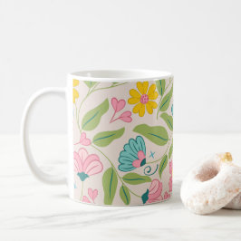 Frühjahrsmuster auf Rosa Kaffeetasse