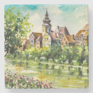 Frühling in der kleinen Stadt auf dem Fluss Steinuntersetzer