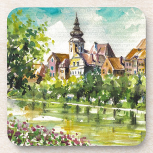 Frühling in der kleinen Stadt auf dem Fluss Untersetzer