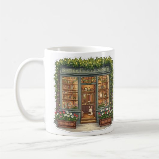 Frühling Osterladen mit süßem lesendem Hasen Kaffeetasse (Links)
