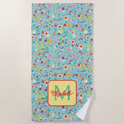 Frühlingsblumen auf aquablauem Monogramm Strandtuch (Vorderseite)