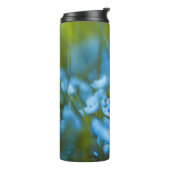 Frühlingsblumen auf dem Feld Thermosbecher (Nach links gedreht)