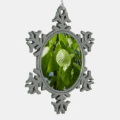 Frühlingshbse Verlasse Grünbäume Schneeflocken Zinn-Ornament (Links)