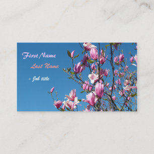 Frühlingsrosa Magnolienblüten am blauen Himmel Visitenkarte