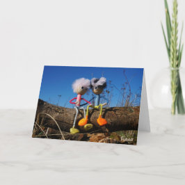 Fubby paartje dat samen op een boomstam zit. dankeskarte