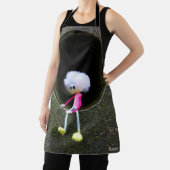 Fubby poppetje dat in een muur zit. schürze (InSitu)