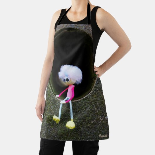 Fubby poppetje dat in een muur zit. schürze (InSitu)