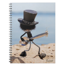 Fubby rock gitarist met hoed op het strand. notizblock