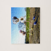 Fubby's in natuur met madeliefjes. puzzle (Vertikal)