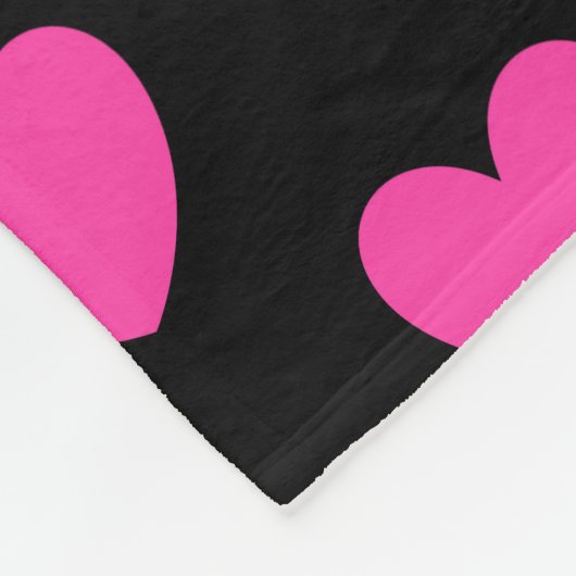 Fuchsienrosa Polka-Herzen auf schwarz Fleecedecke (Ecke)