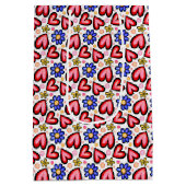 Fun Red Hearts und Lila gelbe Blumen Mittlere Geschenktüte (Rückseite)