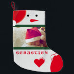 Fun Snowman Ihr Foto Name Niedlich Baby Kleinkind  Kleiner Weihnachtsstrumpf<br><div class="desc">Adorable niedliche Gestaltung mit einem Weihnachtsschneemann mit einem roten Hut des Weihnachtsmannes,  zwei individuellen Fotos,  dem Namen Ihres Kindes,  alles auf einem großen Weihnachtsfeiertag Strumpf,  um auf dem Mantel an Weihnachten zu hängen. Der Hintergrund ist ein schneeweißer gestrickter Hintergrund mit schneebedeckten weißen Strickherzen.</div>