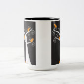 Fünf orangefarbene Vögel in einer Tasse (Mittel)