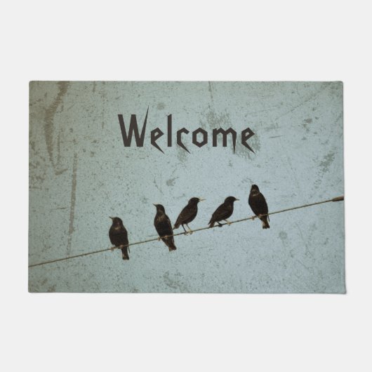 Fünf schwarze Kreuze auf einem Draht Fußmatte (Vorderseite)