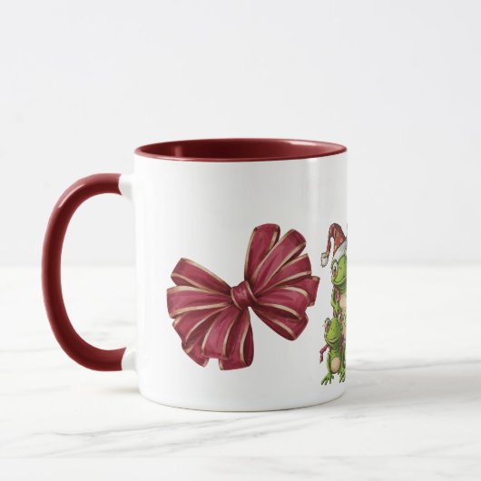 Fünf Weihnachtsfrosche mit Weihnachtsmannmütze Tasse (Links)